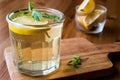 Homemade ice tea with lemon and mint leaves. Royalty Free Stock Photo