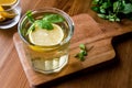 Homemade ice tea with lemon and mint leaves. Royalty Free Stock Photo