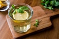 Homemade ice tea with lemon and mint leaves. Royalty Free Stock Photo