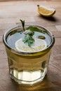 Homemade ice tea with lemon and mint leaves. Royalty Free Stock Photo