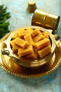 Indian celebration background- kesar,burfi,peda