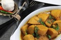 Homemade Indian Taro root  curry or Yam curry on a wooden moody background Royalty Free Stock Photo