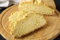 Homemade Irish Soda Bread on a bamboo board on a black surface, low angle view. Close-up Royalty Free Stock Photo