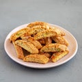 Homemade Italian Cantucci with Pistachio on a Plate, side view. Crispy Pistachio Cookies