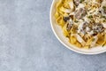 Italian fettuccine pasta (Fettuccine al Funghi Porcini) with mushroom and cream sauce. Traditional Italian cuisine