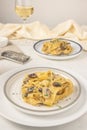 Homemade Italian fettuccine pasta with mushrooms and parmesan Fettuccine al Funghi Porcini. Traditional Italian cuisine.