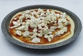 Homemade italian margherita pizza dough with tomato oregano and mozzarella ready to be put in the oven Royalty Free Stock Photo
