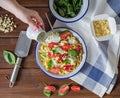 Homemade Italian pasta, sour cream with pesto , cherri tomatoes and basi Royalty Free Stock Photo