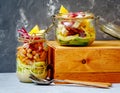 Homemade jar zucchini pasta with tofu, beans and vegetables. Royalty Free Stock Photo