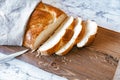 Homemade Jewish traditional challah bread on wooden cutting board