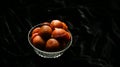 Homemade Kerala snack unniyappam in dark background