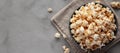 Homemade Kettle Corn Popcorn with Salt in a Bowl, top view. Flat lay, overhead, from above. Space for text Royalty Free Stock Photo