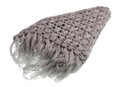 Homemade knitted warm woolen triangular women`s shawl scarf with fringe isolated