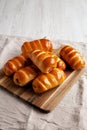 Homemade Kolache Rolls Ready to Eat on a Wooden Board, side view. Copy space