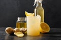 Homemade Kombucha healthy tasty drink in bottle and glass with lemon garnish mint.