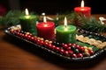 homemade kwanzaa themed decorative candles on a tray