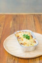 Homemade lasagne bolognese on wood table Royalty Free Stock Photo