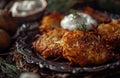 homemade latkes with a dollop of sour cream and a dip