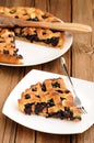 Homemade lattice pie with whole wild blueberries cut in piece Royalty Free Stock Photo
