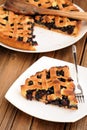 Homemade lattice pie with whole wild blueberries cut in piece Royalty Free Stock Photo