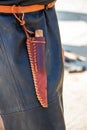 Homemade leather sheath at belt