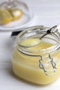 Homemade lemon curd. Lemon curd in a glass jar Royalty Free Stock Photo