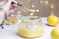 Homemade lemon curd. Lemon curd in a glass jar Royalty Free Stock Photo