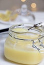 Homemade lemon curd. Lemon curd in a glass jar Royalty Free Stock Photo