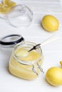 Homemade lemon curd. Lemon curd in a glass jar Royalty Free Stock Photo