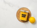 Homemade lemon curd in jar, top view, vertical Royalty Free Stock Photo