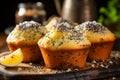 Homemade lemon poppy seed muffins on a blurred background with text space for concept