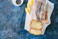 Homemade lemon poppy seed pound cake with glaze on a wire rack. Royalty Free Stock Photo