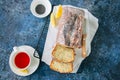 Homemade lemon poppy seed pound cake with glaze on a wire rack, Royalty Free Stock Photo