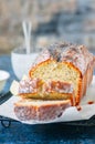 Homemade lemon poppy seed pound cake with glaze on a wire rack. Royalty Free Stock Photo