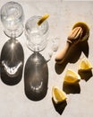 Homemade lemonade with fresh lemons two glasses on a marble table. Cold drink. Hard light Royalty Free Stock Photo