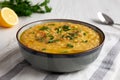 Homemade Lentil Soup with Parsley in a Bowl on a white wooden background, low angle view. Close-up Royalty Free Stock Photo