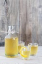 Homemade limonchello on the wooden background Royalty Free Stock Photo