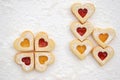 Homemade linzer cookies filled with strawberry and apricot jam Royalty Free Stock Photo