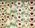Homemade linzer cookies of five shapes filled with strawberry jam Royalty Free Stock Photo