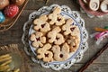 Homemade Linzer Easter cookies with eggs decorated with wax