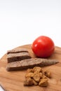 Homemade liverwurst and cracklings with tomatoes Royalty Free Stock Photo