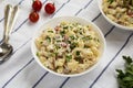 Homemade Macaroni Salad in white bowls, side view Royalty Free Stock Photo