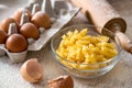 Homemade macaroni on the wooden table