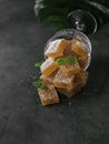 Homemade from mango and passionfruit jelly candies in sugar with mint. Homemade marmalade candy Royalty Free Stock Photo