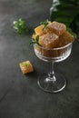 Homemade from mango and passionfruit jelly candies in sugar with mint. Homemade marmalade candy Royalty Free Stock Photo