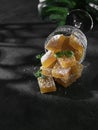 Homemade from mango and passionfruit jelly candies in sugar with mint. Homemade marmalade candy Royalty Free Stock Photo