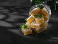 Homemade from mango and passionfruit jelly candies in sugar with mint. Homemade marmalade candy Royalty Free Stock Photo