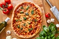 Homemade Margarita Flatbread Pizza with Tomato and Basil. Royalty Free Stock Photo