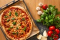 Homemade Margarita Flatbread Pizza with Tomato and Basil. Royalty Free Stock Photo