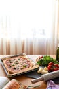 Homemade Margarita Flatbread Pizza with Tomato and Basil. Royalty Free Stock Photo